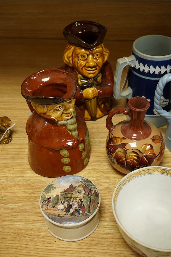 Sundry ceramics to include; Two Prattware pot lids and bases, two Toby jugs, Copeland Spode jug and others (9). Condition - fair